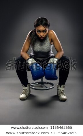 Stock photo: Athletic Woman Wearing Boxing Gloves