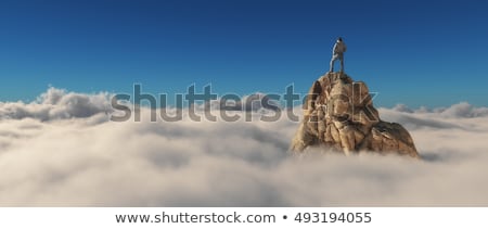 Foto stock: Top Of The Mountain In Clouds