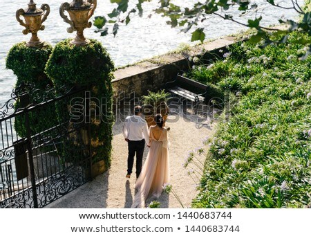 Stock photo: Man And Woman Outdoor In Wedding Attire Bride And Groom