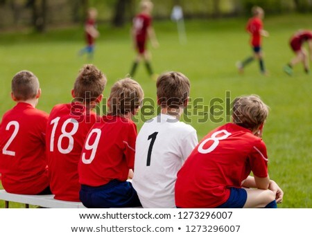 Boys In Sports Soccer Team Sitting On A Substitute Bench Stockfoto © matimix