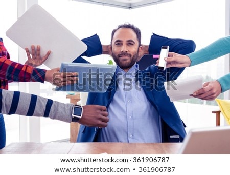Сток-фото: Calm Smiling Young Asian Man Relaxing At Comfortable Office Chair Hands Behind Head Happy Man Resti