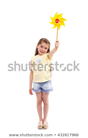 Сток-фото: Portrait Of Cute Girl Holding Pinwheel
