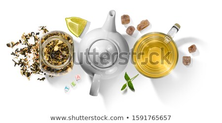 Foto stock: Green Tea With Natural Aromatic Additives And Accessories Top View On White Background