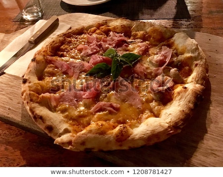 Stock photo: Freshly Baked Hand Tossed Vegetarian Pizza