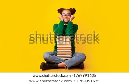 Stok fotoğraf: Stack Of Books With Black Glasses