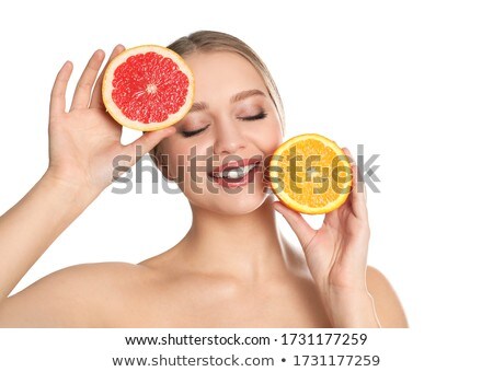 Stock photo: Beautiful Girl With Grapefruit