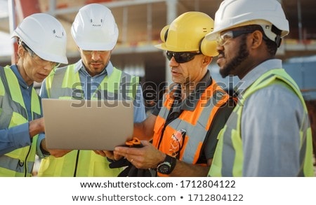 Сток-фото: Businesswoman And Construction Worker