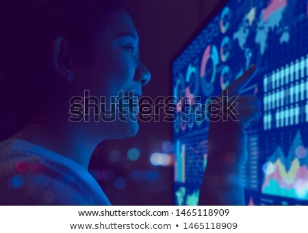 [[stock_photo]]: Woman Pointing At Chart