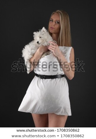 Zdjęcia stock: Portrait Of Beautiful Girl Pretty White West Highland Dog