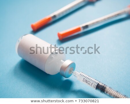 ストックフォト: Diabetes Insulin Syringe And Vial