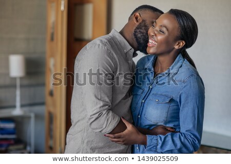 Foto stock: Husband Kissing Wife
