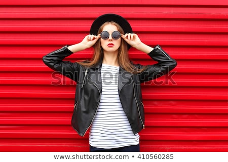 Foto stock: Portrait Of A Fashion Girl With Black Hat Posing