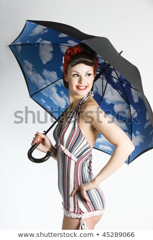 Stockfoto: Beautiful Pin Up Girl With Umbrella Isolated On White