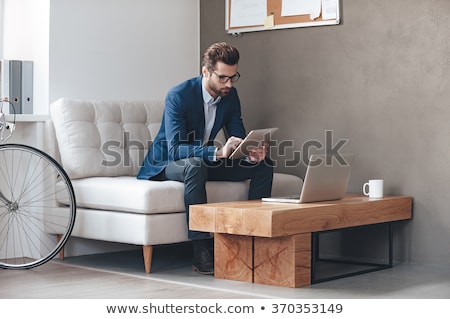 Zdjęcia stock: Pensive Business Man At Laptop