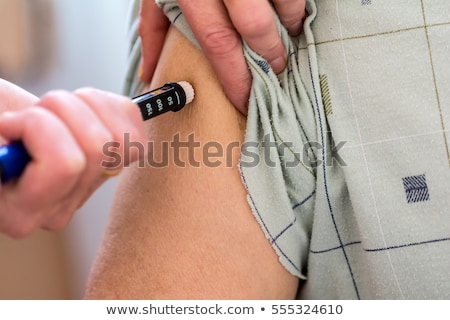 Stok fotoğraf: Man With Syringe Making Insulin Injection