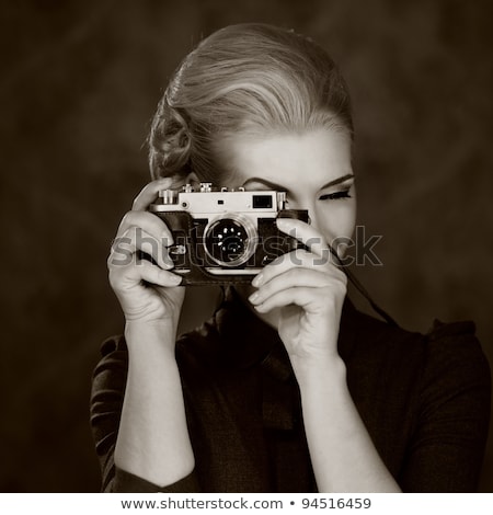 Imagine de stoc: Beautiful Lady With Retro Photo Camera