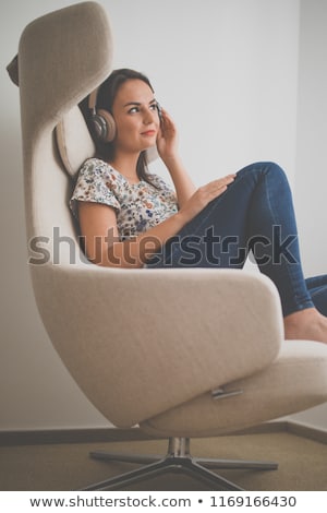 ストックフォト: Pretty Young Woman Listening To Her Favorite Music On Hi Fi Headphones