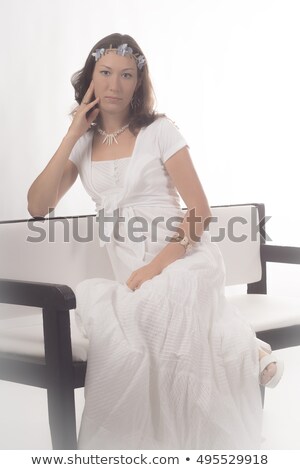 [[stock_photo]]: Elle · fille · russe · est · assise · sur · sa · chaise