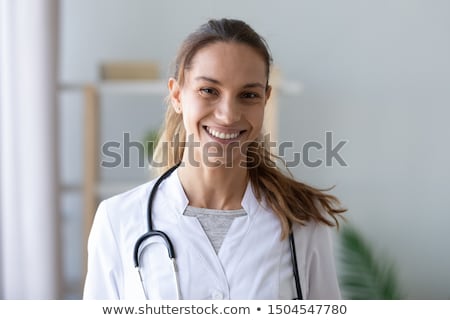 Foto stock: Portrait Of A Young Nurse Or Physician Looking At Camera With Confidence