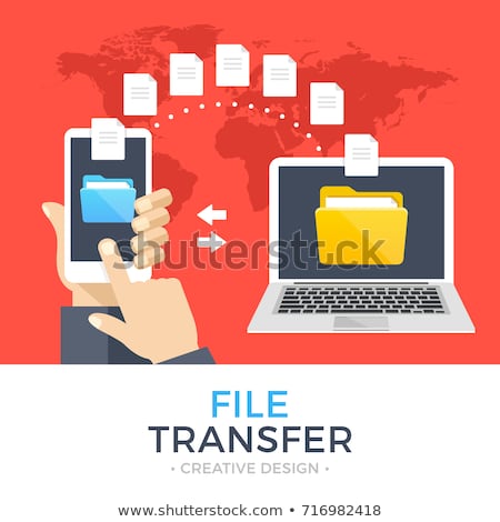 Foto d'archivio: File Transfer Hand Holding Smartphone With Folder On Screen And Documents Transferred To Computer
