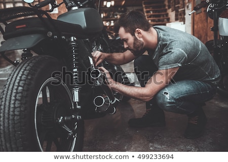 [[stock_photo]]: Mechanic At Work In His Garage