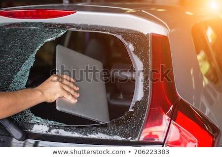Foto stock: Car Burglary