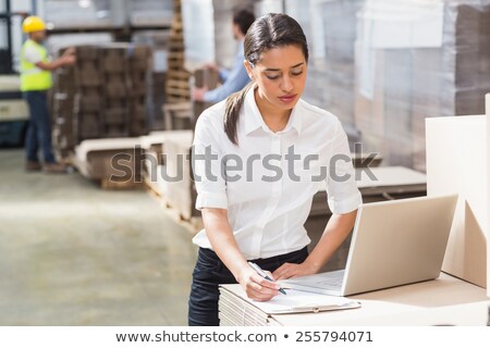 Foto stock: A Pretty Warehouse Manager Computer