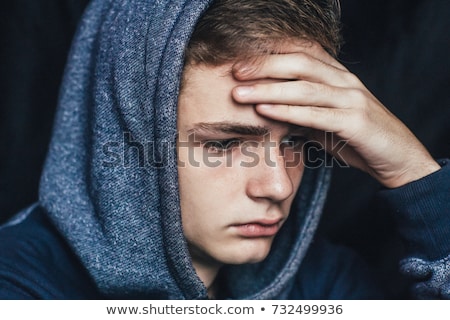 Foto stock: Sad Teenager Boy