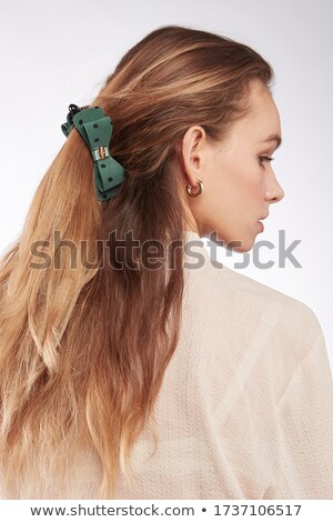 Stock fotó: Blond Woman With A Golden Bow