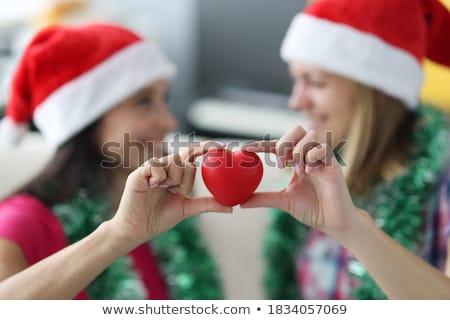 Stock fotó: Close Up Of Happy Lesbian Couple With Red Hearts