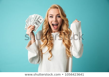 ストックフォト: Portrait Of An Excited Blonde Woman