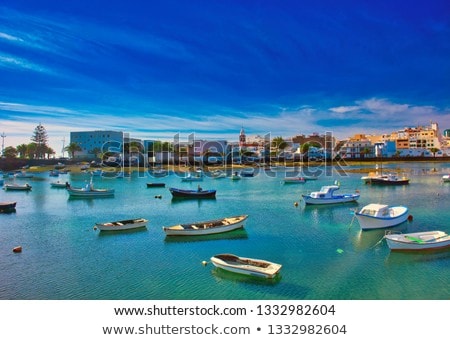 Stock photo: Arrecife In Lanzarote Charco De San Gines Boats And Promenade