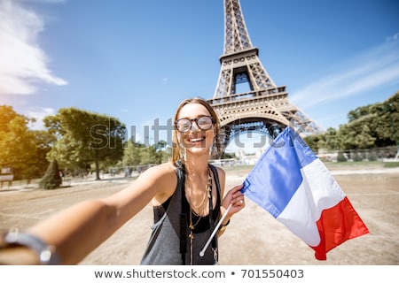 Stok fotoğraf: Beautiful Young Woman With Paris Symbol Eiffel Tower