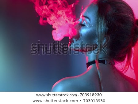 Foto stock: Hipster Girl Smoking Cigarette