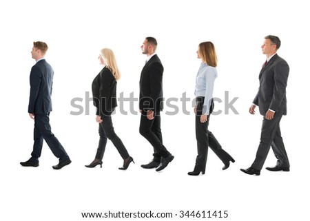 Stock fotó: Side View Of Group Of Diverse Business People Walking Together In Lobby Office