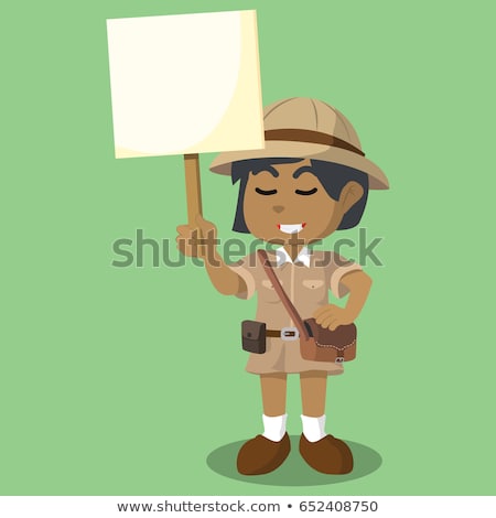 商業照片: Explorer Holding A Sign