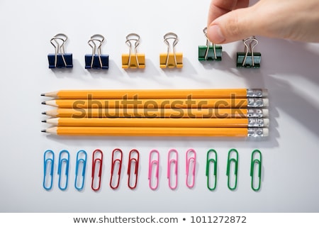 Stockfoto: Compulsive Perfectionist Hand Arranging Pencils