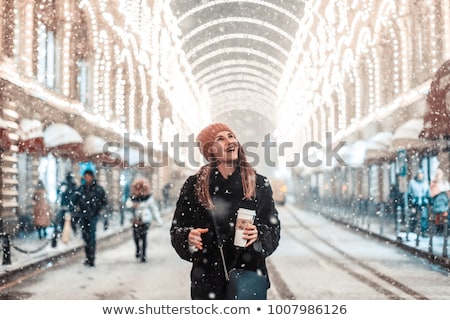 Сток-фото: A Young Woman Walking On The Red Square In Moscow