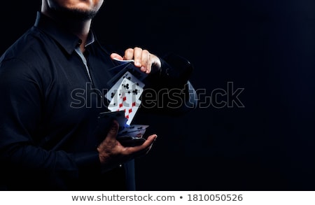 Foto stock: Hands And Playing Cards Trick