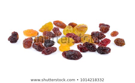 Stock fotó: Brown Raisins On A White Background