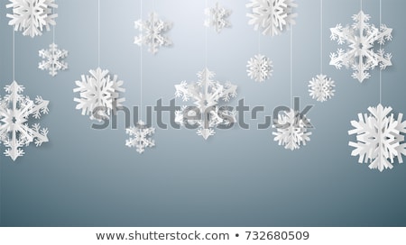 Foto d'archivio: Snowflakes Background In Paper Effect