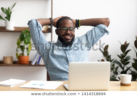 Stock fotó: African Businessman Holding Hand Behind Head