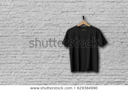 Foto stock: Black Tshirt On Hanger