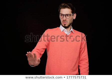 Bearded Man In Business Clothes Disgusts And Looking At Camera Stockfoto © Pressmaster