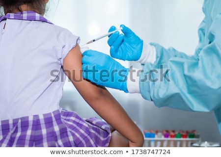 Zdjęcia stock: A Girl Having Vaccine At Hospital