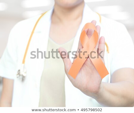 Foto d'archivio: Doctor With Uterine Cancer Awareness Concept