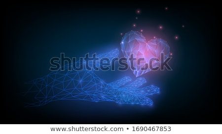 [[stock_photo]]: Cyber Heart In Human Hand