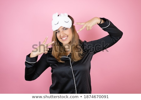 Stock foto: Two Cheerful Girls Wearing Pajamas Standing