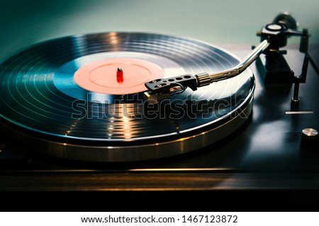 Foto stock: Turntable Playing Vinyl Record With Music