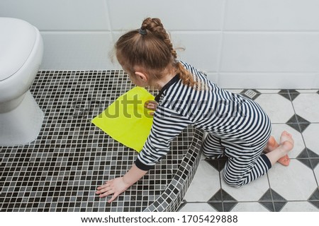 Stock photo: Little Girl Dusting